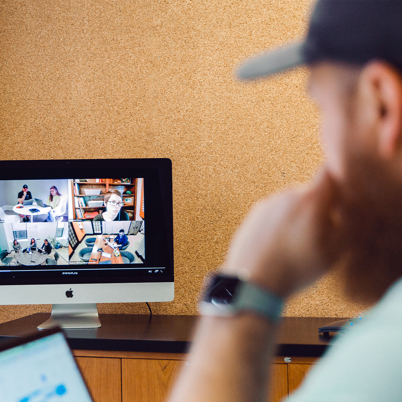 A project manager participates in a virtual meeting