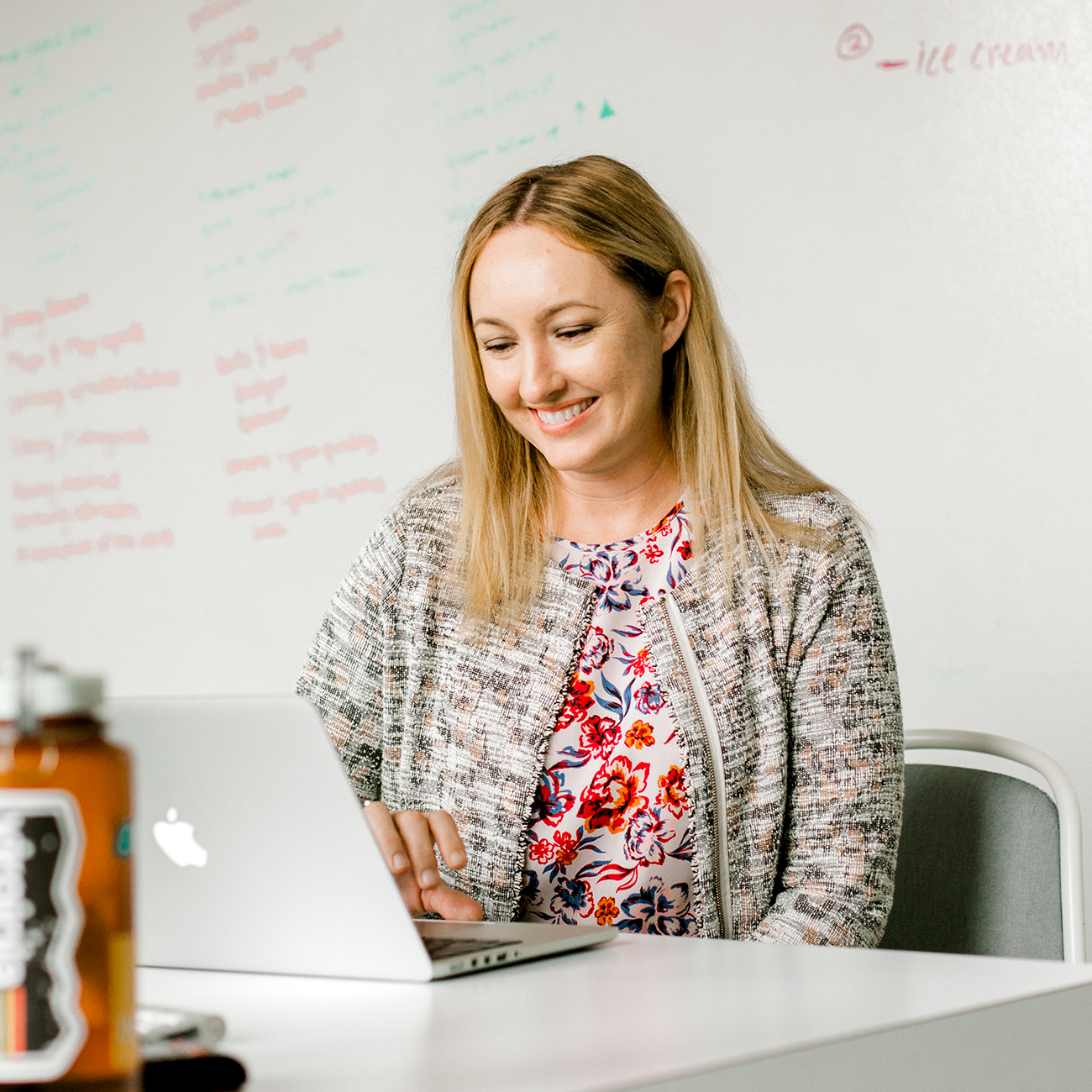 A brand writer works on a communications deliverable.