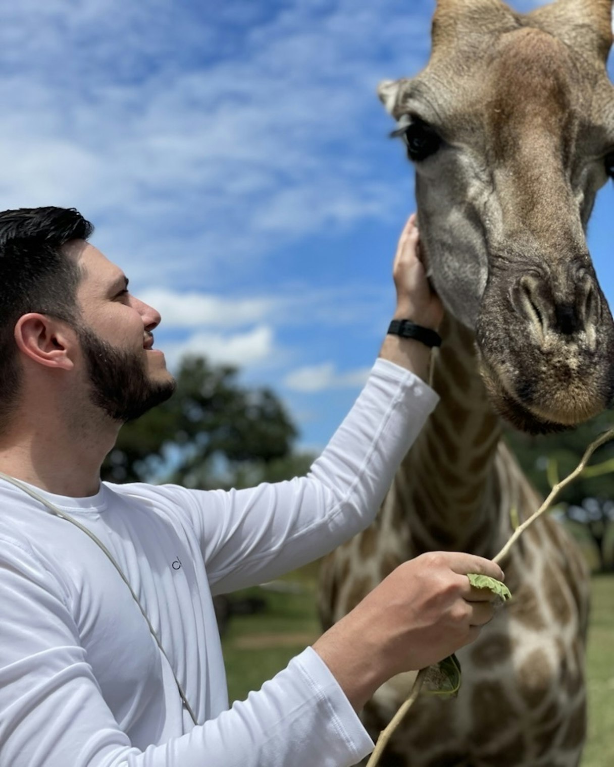 Yohann with a giraffe