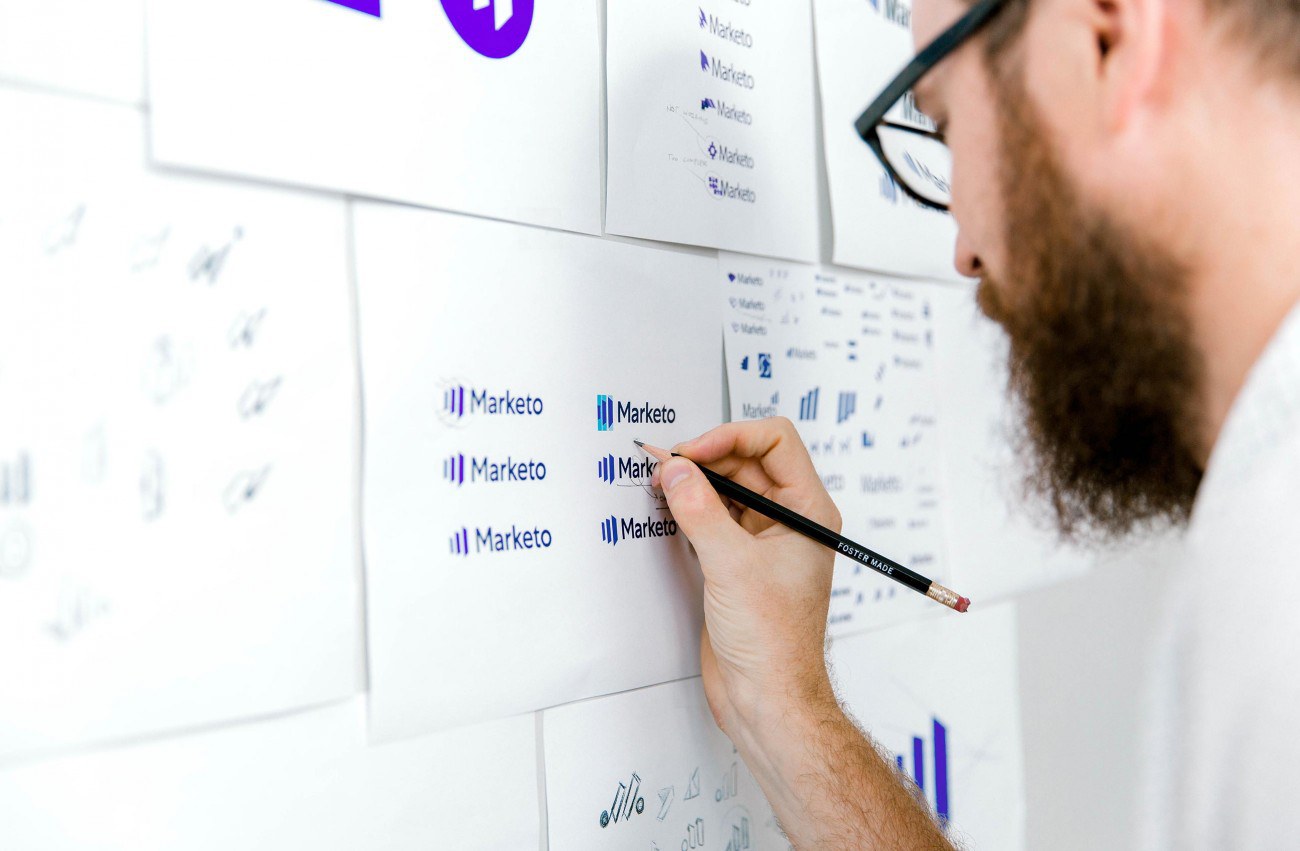 A designer makes notes on his work.